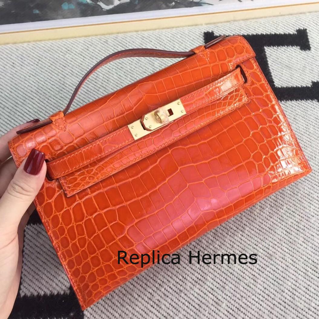 Replica Hermes Orange Kelly Pochette Shiny Niloticus Crocodile Bag