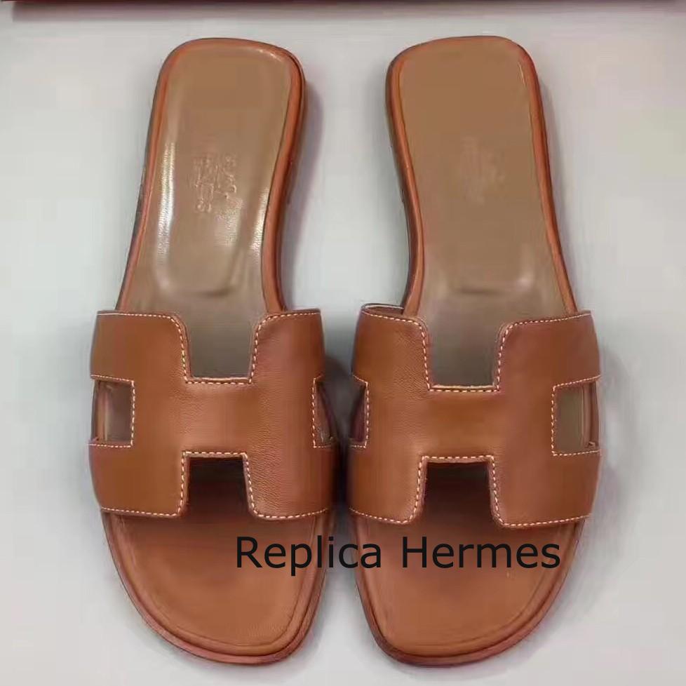 Hermes Oran Sandals In Gold Swift Leather