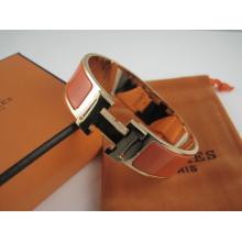 Hermes Orange Enamel Clic H Bracelet Narrow Width (18mm) In Gold Replica